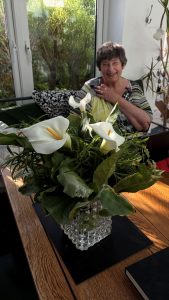 A vase of arum lillies