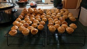 Trays of frehly baked pork pies.